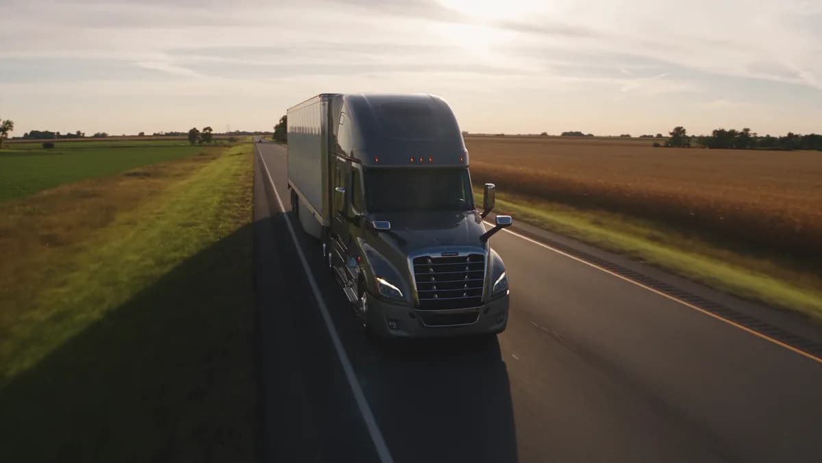 A semi truck on an open highway, captured from the AMO film.
